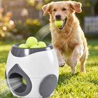 Dog catching a ball launched from the 2-in-1 automatic ball launcher outdoors